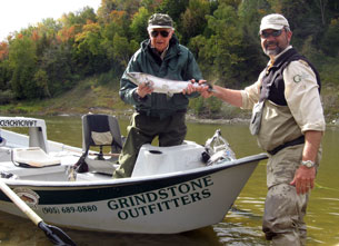 John Valk with client on a Salmon trip.